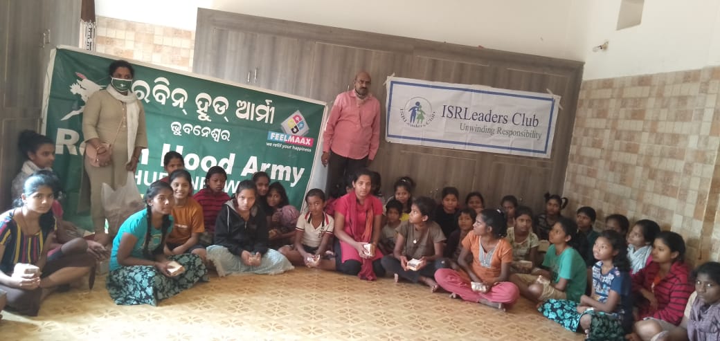 Distribution of Snacks among the inmates of a Child Care Centre in association with Robin Hood Army in Bhubaneswar